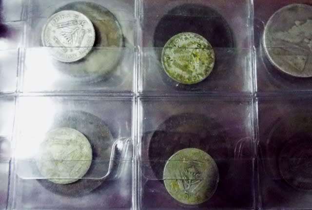 coin album with 60  coins at R1 start about 1/2 silver