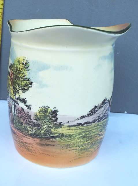 RARE .... Royal Doulton series ware milk jar  decorated with cottage scenes against a lemon yellow