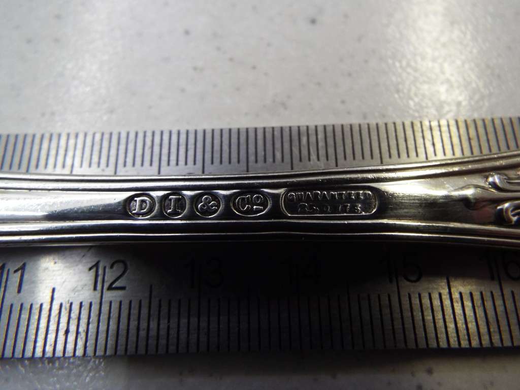 Antique English table spoons full of hallmarks