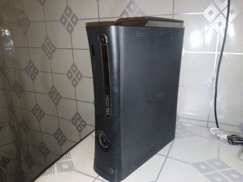 BLACK XBOX 360 120 GIG WITH 2 WIRELESS CONTROLLERS,HDMI,AV CABLE. POWER BRICK NOT INCL.