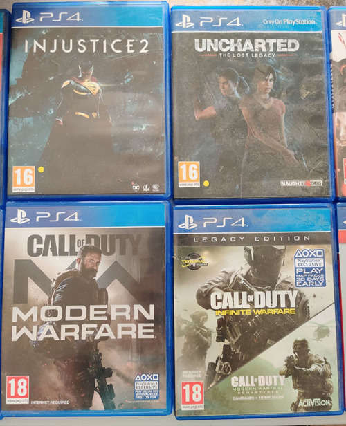 4x ps4 games - Injustice 2, Uncharted lost legacy, Call of duty Modern Warfare, COD infinite warfare