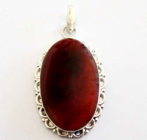 A LARGE SOLID SILVER ,925 CARNELIAN PENDANT
