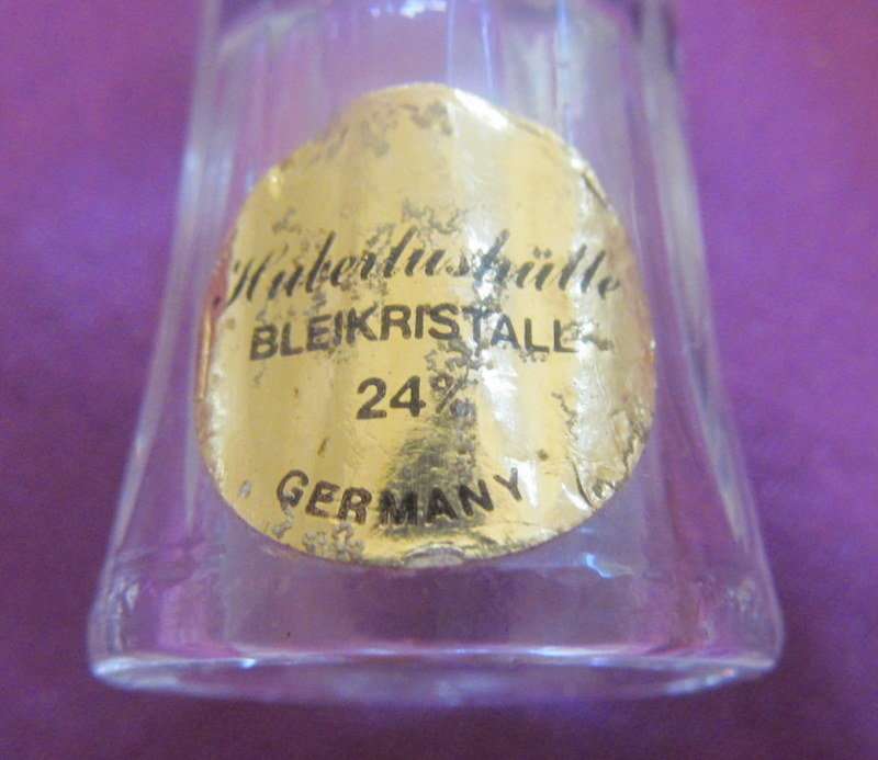 A CLEAR GLASS THIMBLE