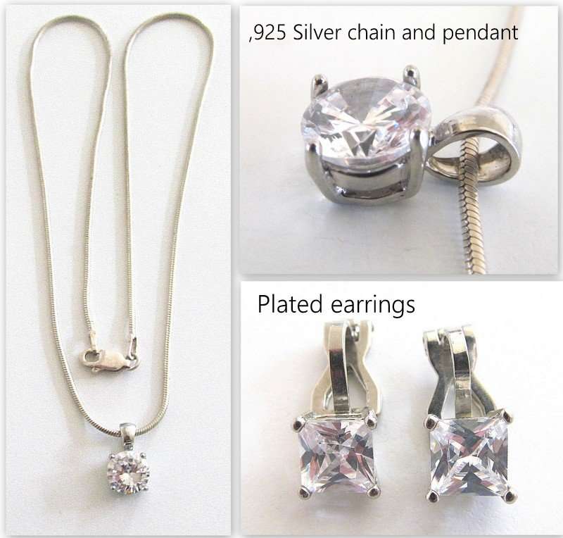 A SOLID SILVER PENDANT ON A SILVER SNAKE CHAIN PLUS SIMILAR PLATED EARRINGS