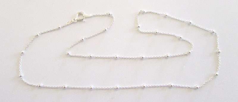 A SOLID SILVER CHAIN WITH GRADUATED BALLS --NEW---42cm