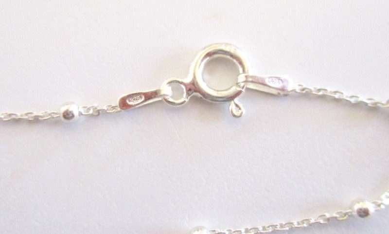 A SOLID SILVER CHAIN WITH GRADUATED BALLS --NEW---42cm