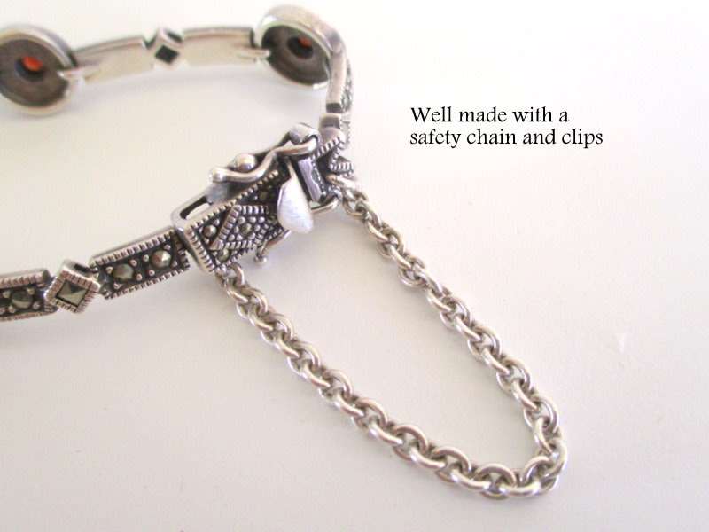 A STUNNING SOLID SILVER GARNET AND MARCASITE BRACELET--Weight 15gram