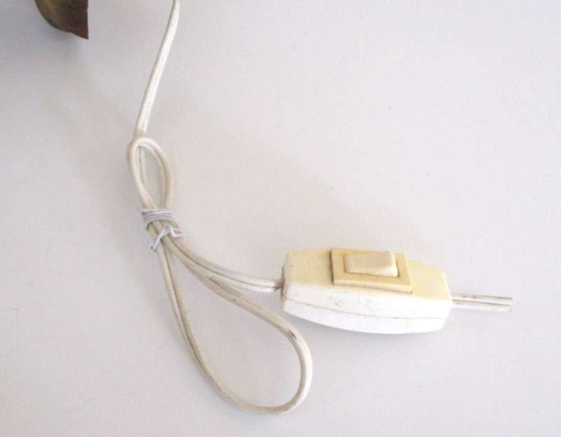 A SOLID BRASS WALL LIGHT--LOW START