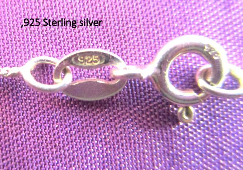 A STERLING SILVER TREE OF LIFE PENDANT ON A STERLING SILVER CHAIN