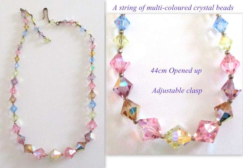 A VINTAGE 1 STRING MULTI-COLOURED CRYSTAL NECKLACE WITH A STERLING SILVER CLASP--READ