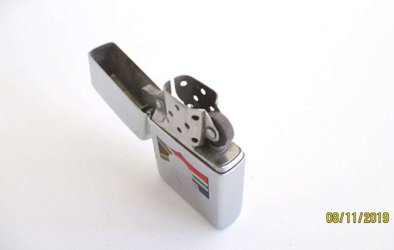 2 ZIPPO LIGHTERS-Check your load shedding times