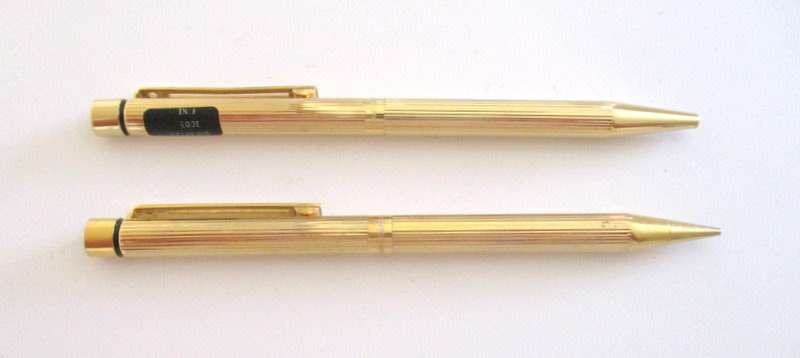 A SHEAFFER PEN AND PENCIL SET STAMPED GOLD ELECTROPLATE
