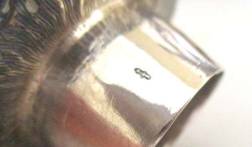 A DUTCH ETCHED GLASS BOTTLE WITH A HALLMARKED SILVER TOP--PRE 1906