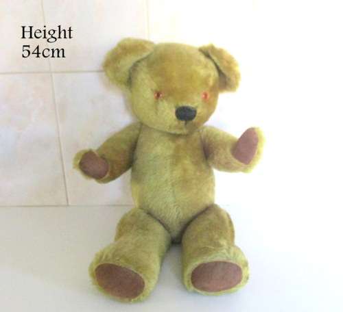 A VINTAGE PLUSH TEDDY BEAR--MAY BE A MERRYTHOUGHT