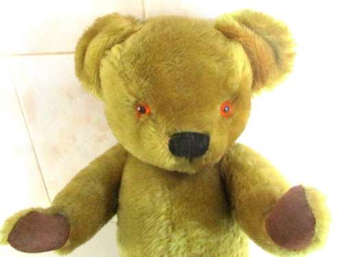A VINTAGE PLUSH TEDDY BEAR--MAY BE A MERRYTHOUGHT