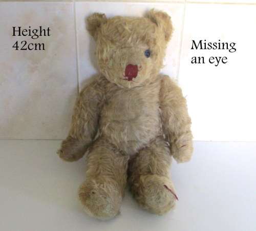 A VINTAGE MOHAIR TEDDY BEAR--NEEDS SOME TLC--PLEASE READ