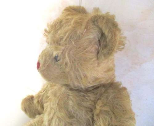 A VINTAGE MOHAIR TEDDY BEAR--NEEDS SOME TLC--PLEASE READ