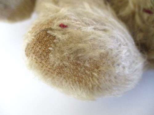 A VINTAGE MOHAIR TEDDY BEAR--NEEDS SOME TLC--PLEASE READ