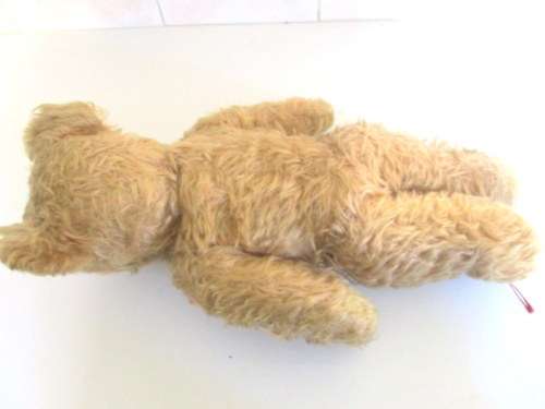 A VINTAGE MOHAIR TEDDY BEAR--NEEDS SOME TLC--PLEASE READ