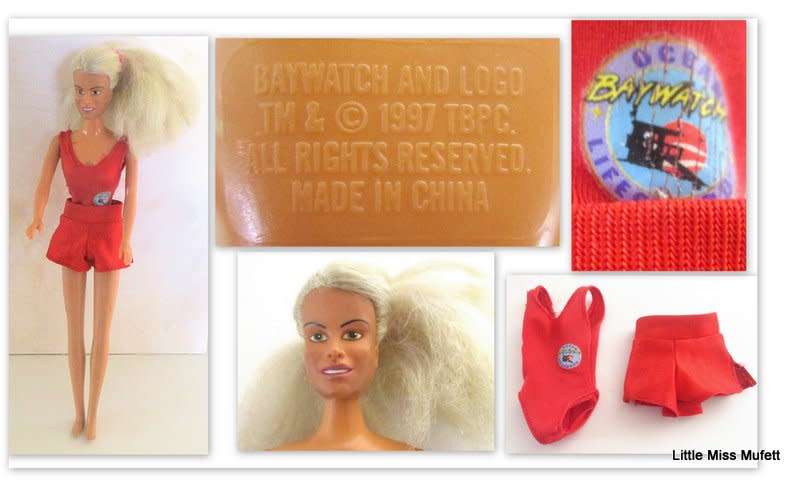 A VINTAGE 1997 BAYWATCH BARBIE DOLL WITH SOME ORIGINAL CLOTHES AND OTHER CLOTHES AND ACCESSORIES