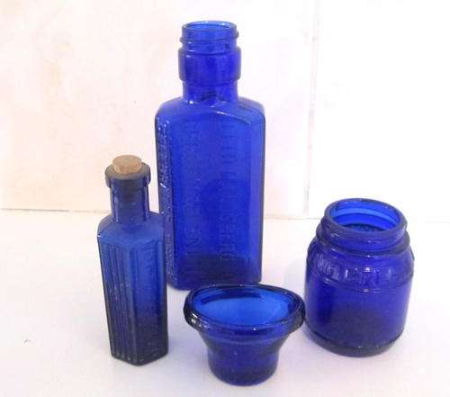 4 LOVELY VINTAGE CLEAN BLUE BOTTLES--One is for eye rinsing