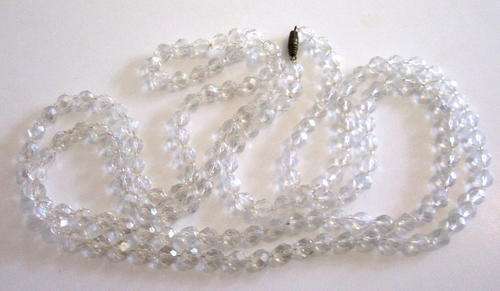 A LONG STRING OF CRYSTAL BEADS--CAN MAKE UP A THREE STRING