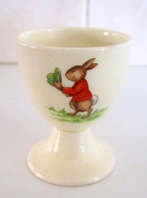 A ROYAL DOULTON EGG CUP--BEATRIX POTTER BUNNYKINS