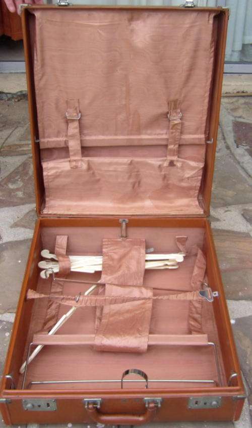 A VINTAGE TRAVELLING SUITCASE--WILL HAVE TO BE COURIED UNLESS BOUGHT IN CAPE TOWN