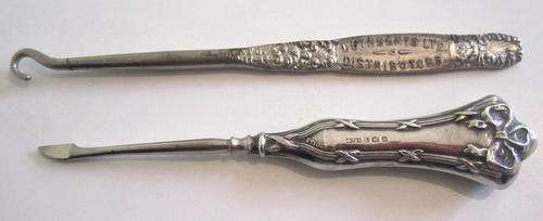 A HALLMARKED SILVER MANICURE ITEM AND AN INTERESTING METAL VICTORIAN CUTHBERTS BUTTON HOOK