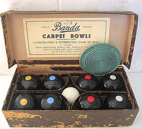 A SET OF CARPET BOWLS