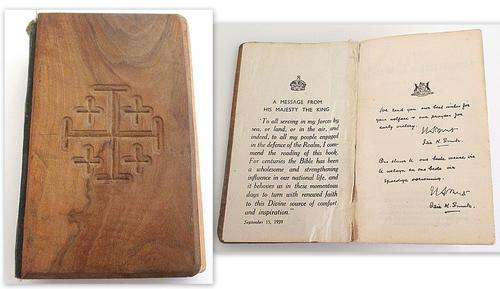 A BIBLE SENT TO TROOPS IN WW 11 WITH A WOODEN COVER AND A MESSAGE FROM THE KING AND ISSIE SMUTS