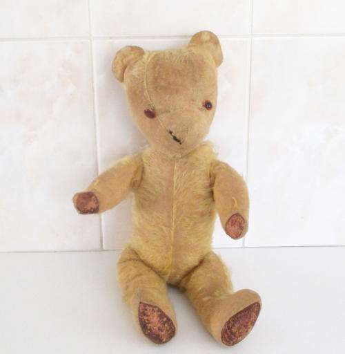 A 1950's MOHAIR  (WELL LOVED) TEDDY BEAR--FOR REPAIR