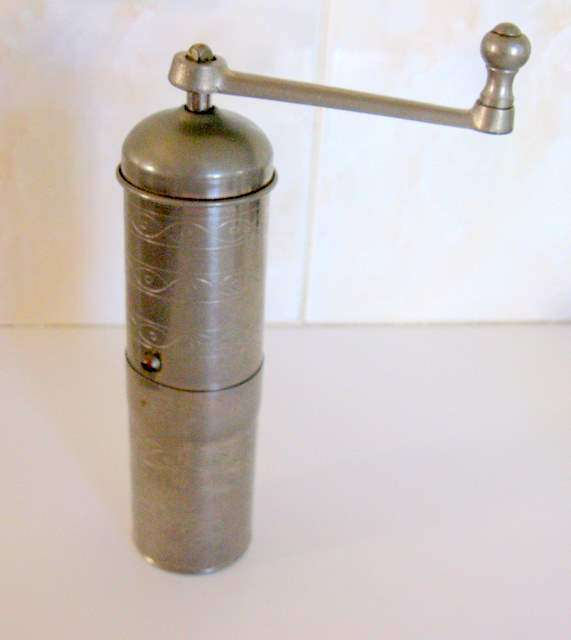 A VINTAGE COFFEE BEAN GRINDER.