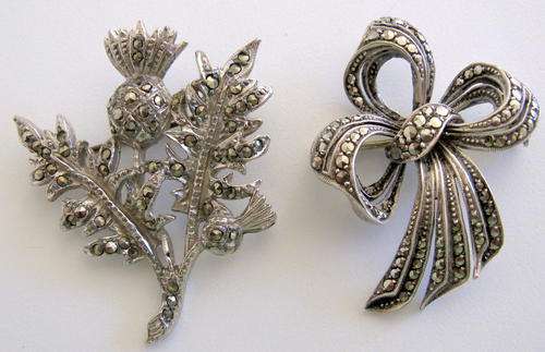 2 MARCASITE BROOCHES--ONE IS SILVER--NOTE