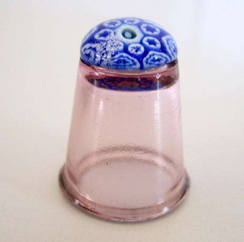 A MILLEFIORI  GLASS THIMBLE