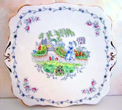A PRETTY BELL CHINA SERVING CAKE PLATE