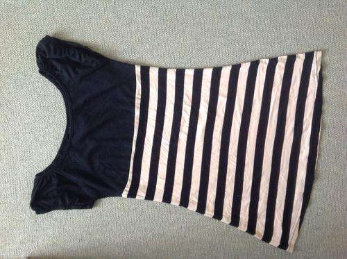 Striped black and beige top fits a size 32 to 34