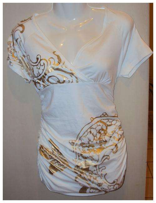 White top with gold pattern detail