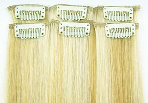 100% hunman hair clip on extentions 20 inch meduim light blonde
