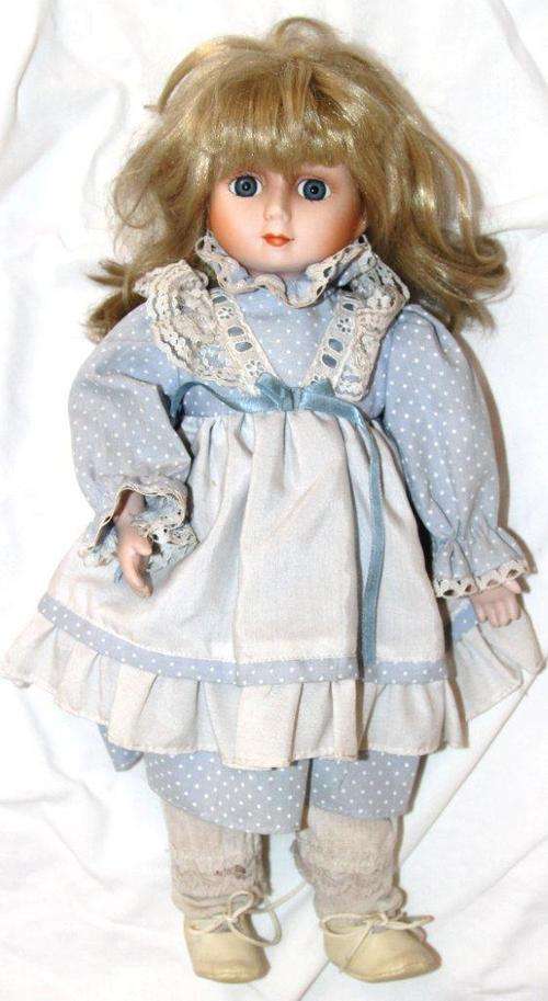 Vintage porcelain doll - 39 cm high