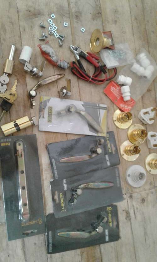 A whole lot of small electrical plugs, 2 pin bulb holders, lockers with keys, window handles and mor