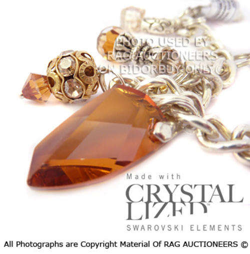 **R600** Elegant GENUINE SWAROVSKI Bracelet In Golds and Coppers