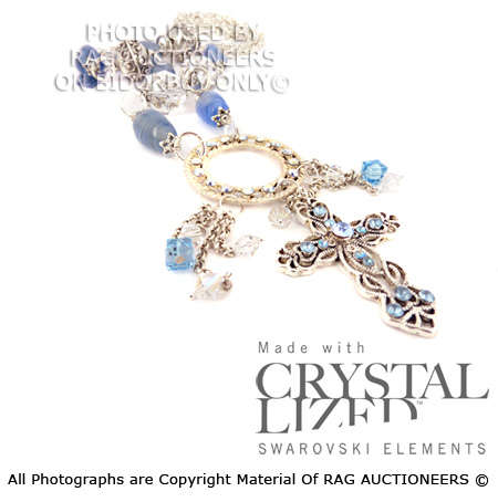 Win This Light Sapphire Cross Necklace Valued at R840 and Get A Bracelet Worth R320