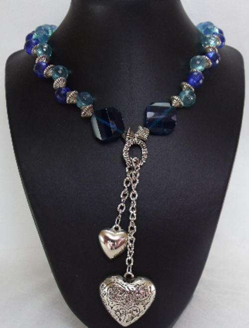 Stunning Heart necklace with Heart earrings by: Cooper & Lombard Jewellry