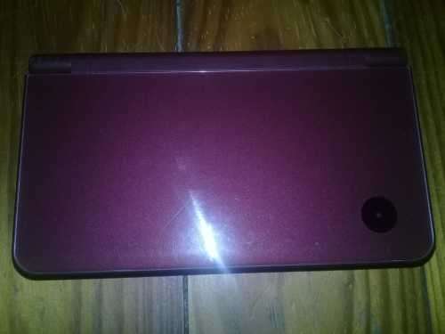 Nintendo DSi XL Maroon + 5 Games