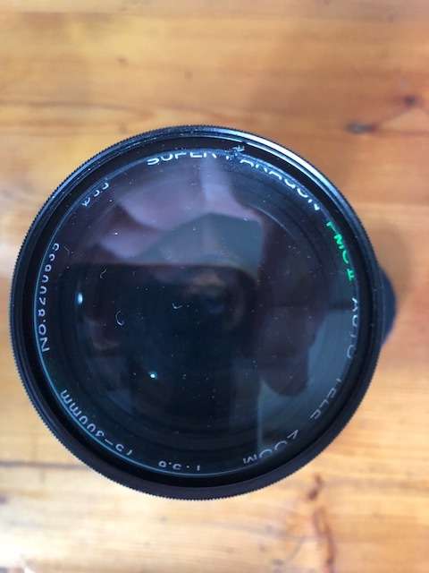 Photax Super Paragon Auto Tele 75 - 300 mm Zoom lens in immaculate condition in leather holder