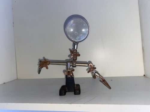 For Handymen: Vintage magnifying glass fitted with clamps