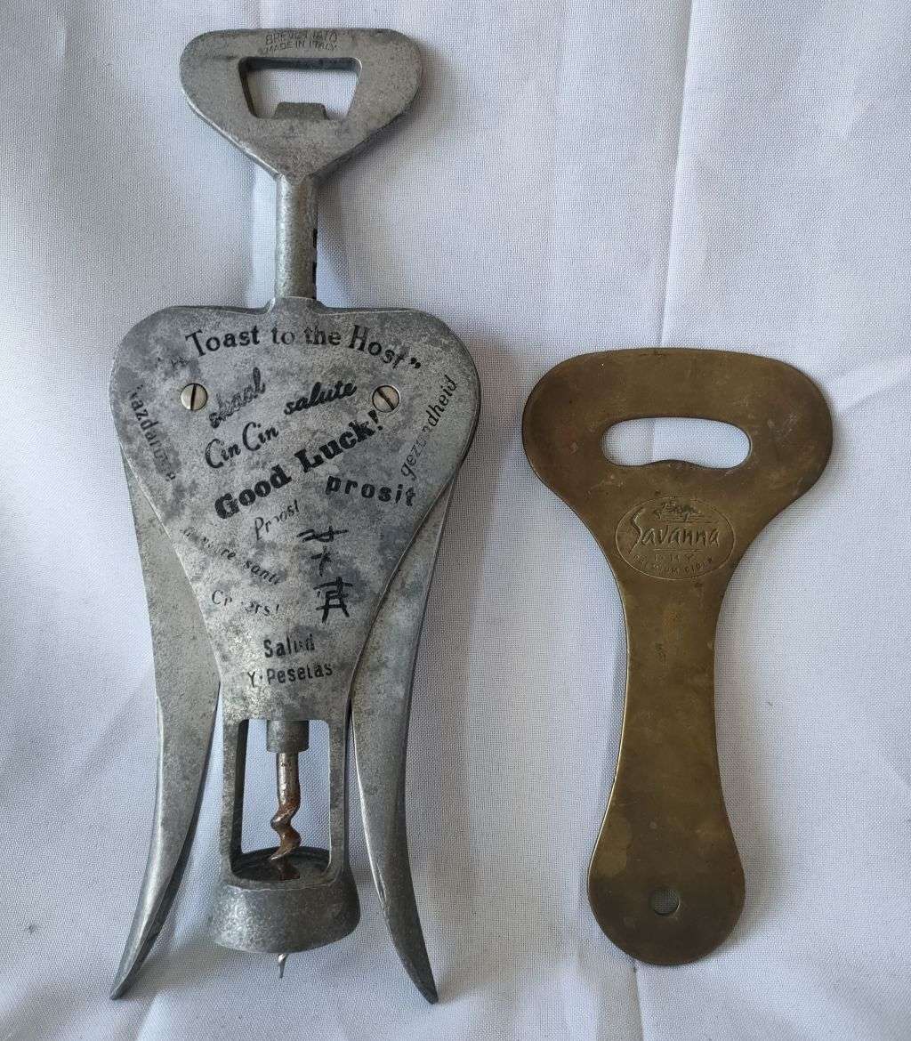 Very Collectable Italian corkscrew with makers mark and a brass bottle opener
