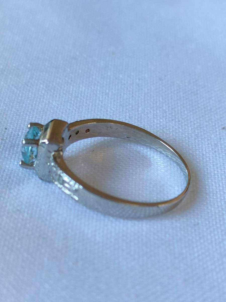 Sterling Silver Blue Topaz and  diamond ring: Size: US 7: Weight: 0.50 ct