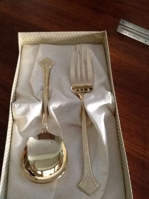 Genuine vintage 24ct goldplated serving spoons in pristine condition.